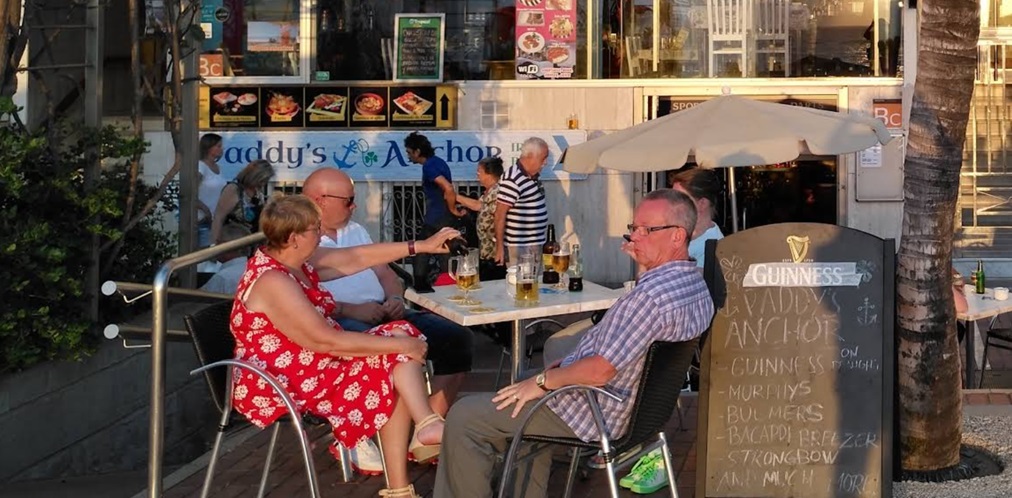 Outdoor seating beside Canteras Beach at Paddy's Anchor